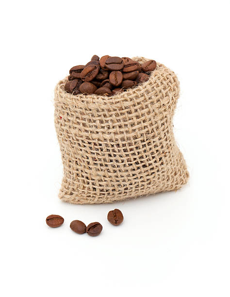 istock coffee beans in burlap bag isolated on white background 466065433