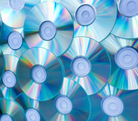 colorful background of compact discs