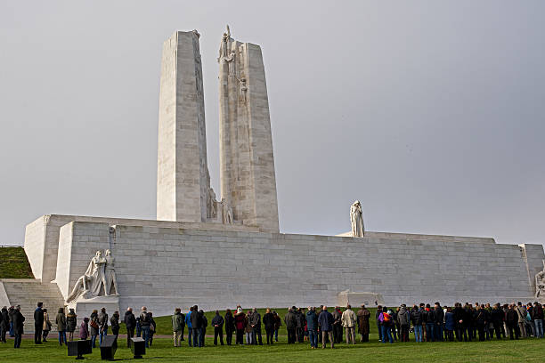 Remembrance Day, Canadian War Memorial, Vimy Ridge November 11. 2014 Vimy Ridge, France, November 11, 2014. The gathering for the Remembrance Day Service in honour of those Canadians who gave their lives during WW1, held at at the Canadian War Memorial, designed by Walter Seymour Allward and unveiled in 1936. vimy memorial stock pictures, royalty-free photos & images
