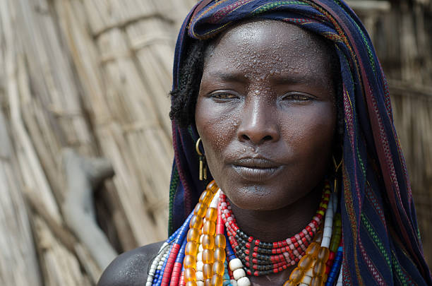 Portrait of unidentified woman from Arbore tribe, Ethiopia Arbore, Ethiopia - August 13, 2014: unidentified woman from Arbore tribe. Arbore women use a lot of bead necklaces as personal decoration.  omo river photos stock pictures, royalty-free photos & images