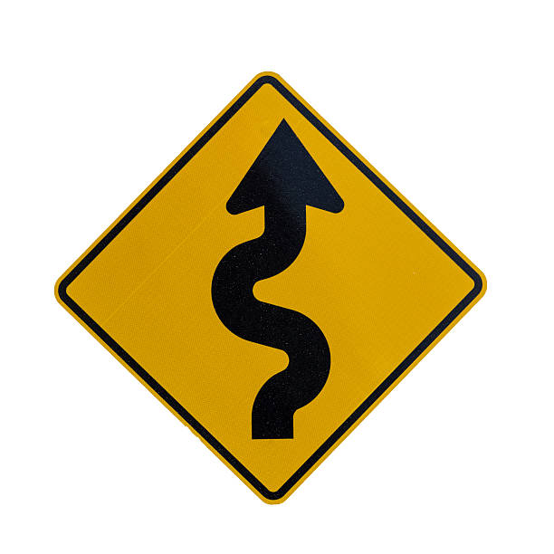 istock Road sign indicating curves ahead 466076284