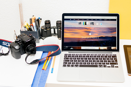Paris, France - March 10, 2015:  Apple Computers website on MacBook Retina in photographer room showcasing Shot on iPhone 6 campaign as seen on 10 March, 2015