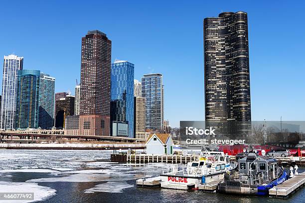 Police Boats And Skyscrapers Mouth Of Frozen Chicago River Stock Photo - Download Image Now