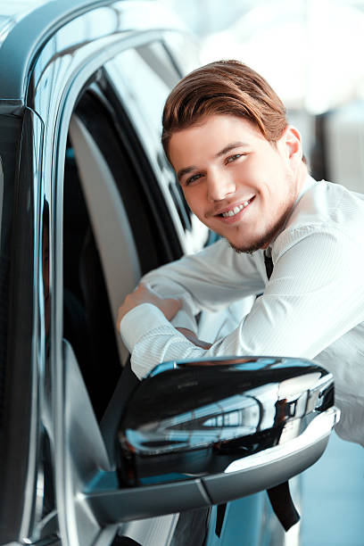 istock Handsome young man in dealership 466082314