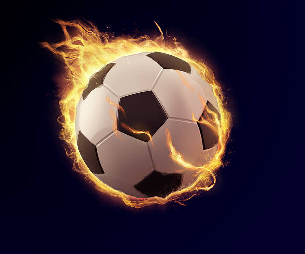 istock soccer ball in orange flame 466085772