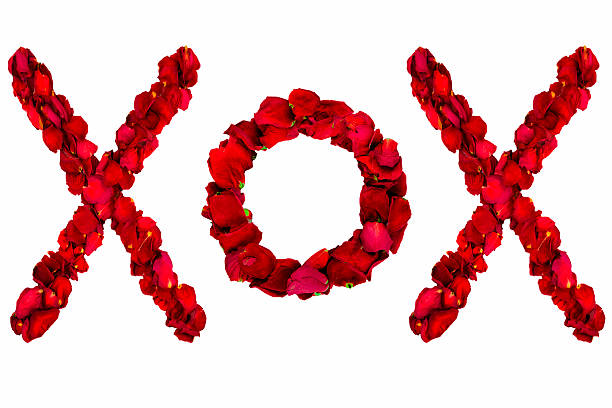 istock Red dried rose petals spelling XOX 466085877