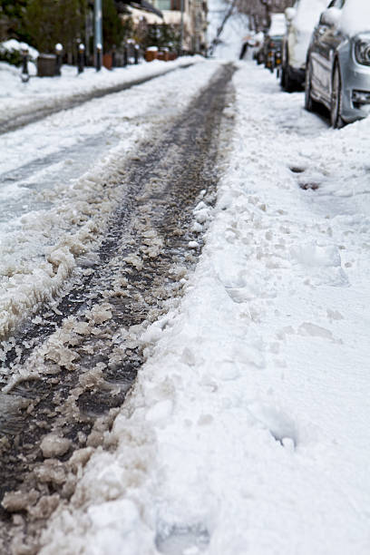 istock Snow-covered road, the marks of wheels 466085992