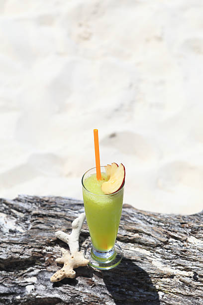 istock fruit cocktail on a tropical island beach 466086479