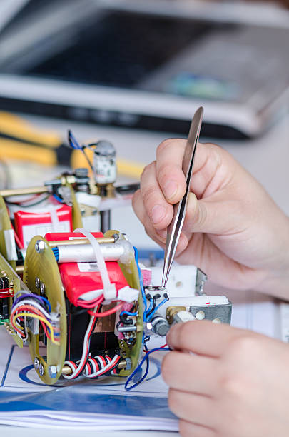 istock repairing of the electronic 466086878