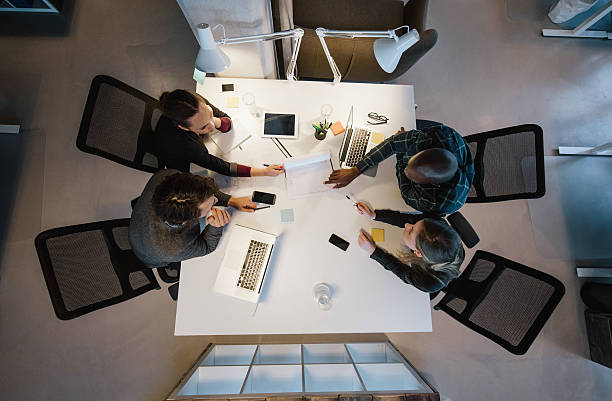 istock Multi-ethnic business people discussing in board room meeting 466089708