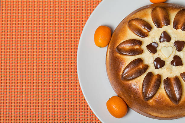 pie on orange background top view