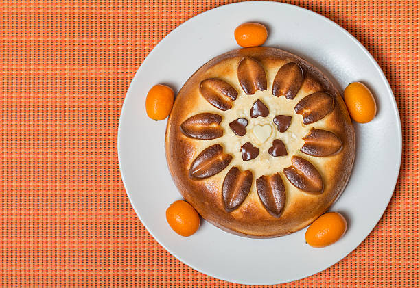 pie on orange background top view