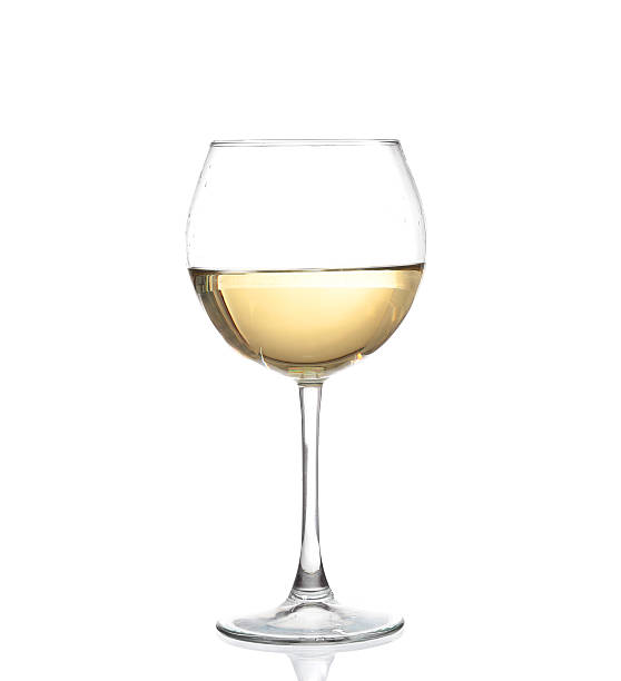 istock WHITE wine swirling in a goblet wine glass, isolated 466091026