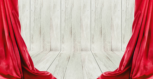 istock Red curtain on wood background. 466091828