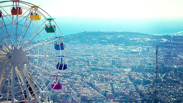 Looking at Barcelona from Mount Tibidabo with a ferris wheel
