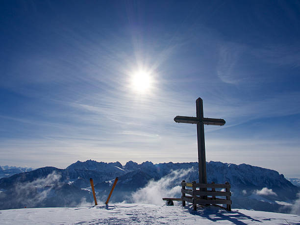 Single young Asian woman standing at edge of Schafberg mountain (the mountain in movie 'sound of music'), Austria