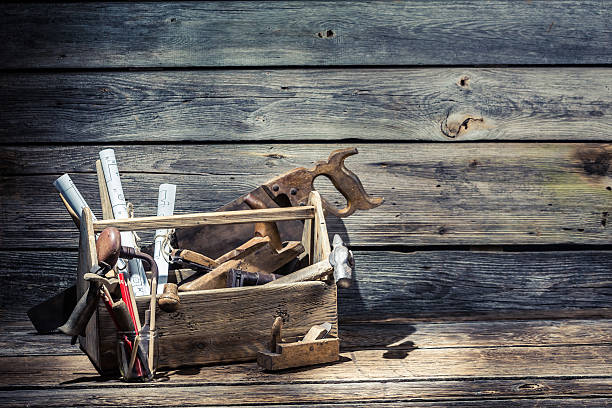 istock Hammer, saw and planer in the carpentry toolbox 466097716
