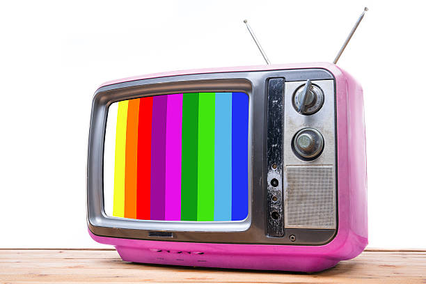 istock Pink Vintage TV on wood table 466098394