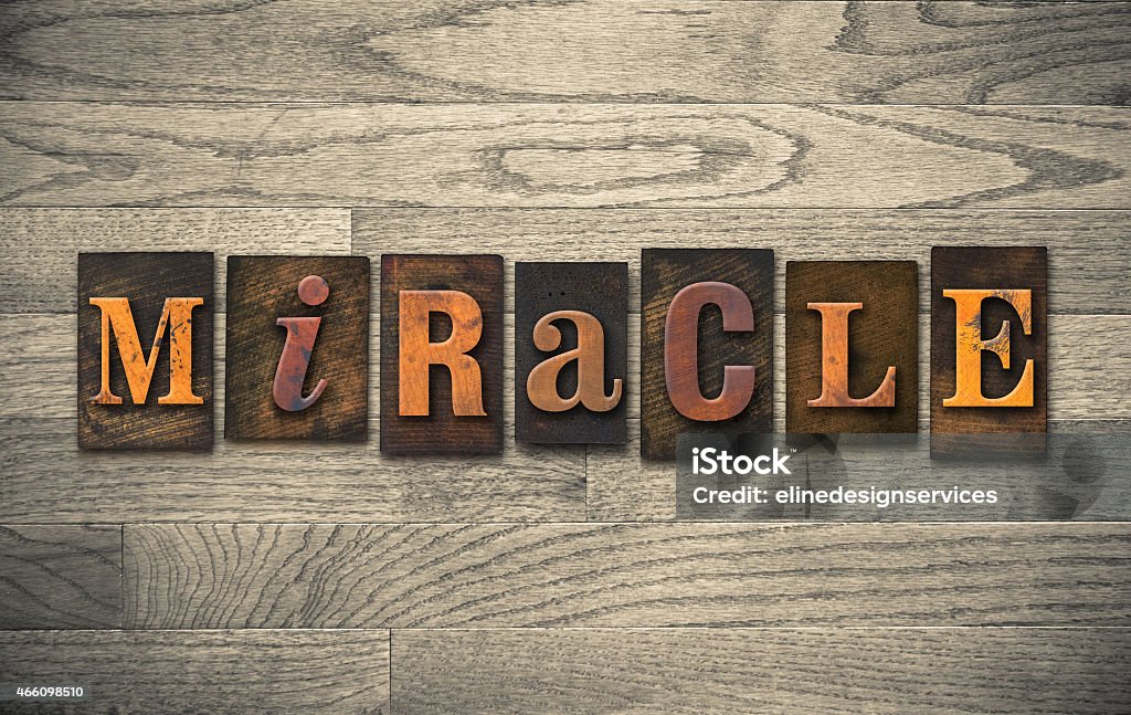 Miracle Wooden Letterpress Concept The word "MIRACLE" written in vintage wooden letterpress type. Miracle Stock Photo