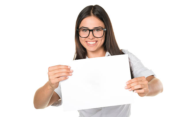 istock Young Woman Holding a Blank White Sign 466098919