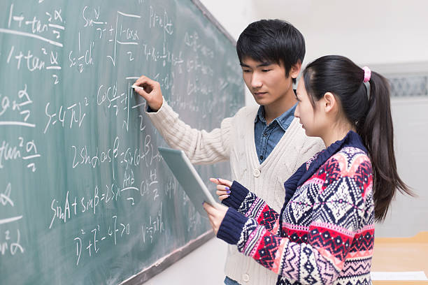 istock College students to write formulas on the blackboard 466101021