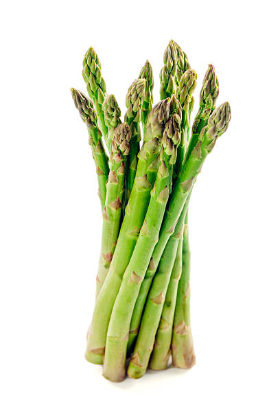 istock Bunch of asparagus isolated on white 466101415