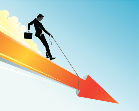 Conceptual business illustration of a businessman trying to ease the fall or downtrend.
