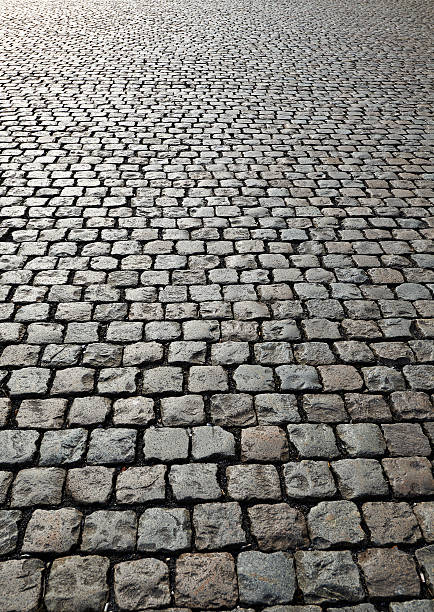 istock Cobbled road on industrial site 466105098
