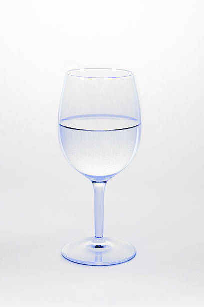 istock Wine glass filled with water isolated on white background 466105499
