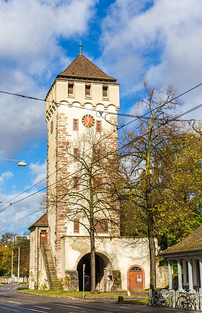 porta di saint john in basilea, svizzera - autumn clock roof colors foto e immagini stock