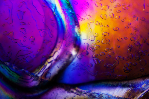Water drops on colorful glass - macro