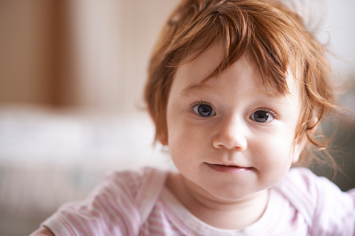 A cute little girl looking at the camerahttp://195.154.178.81/DATA/istock_collage/a13/shoots/785273.jpg