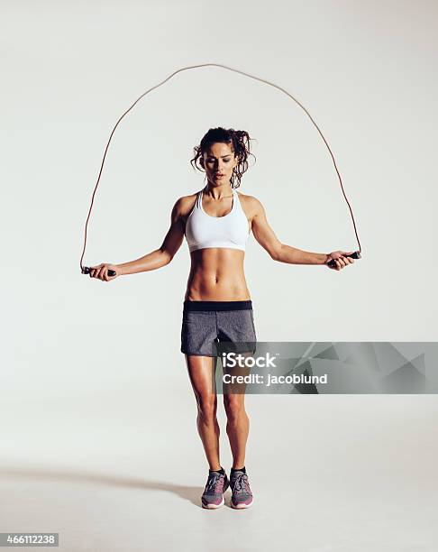 Fit Young Woman Skipping Rope Stock Photo - Download Image Now - Jumping Rope, Jump Rope, Women