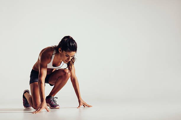 istock Healthy young woman preparing for a run 466112256