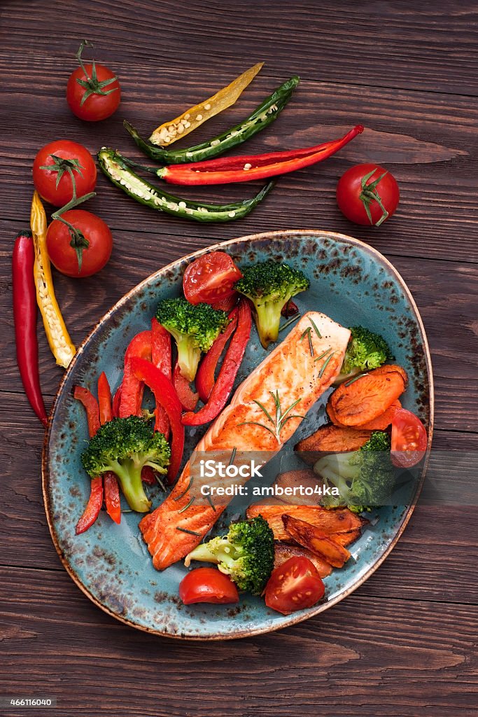 Salmon fish steak Salmon fillet  with vegetables on ceramic plate 2015 Stock Photo