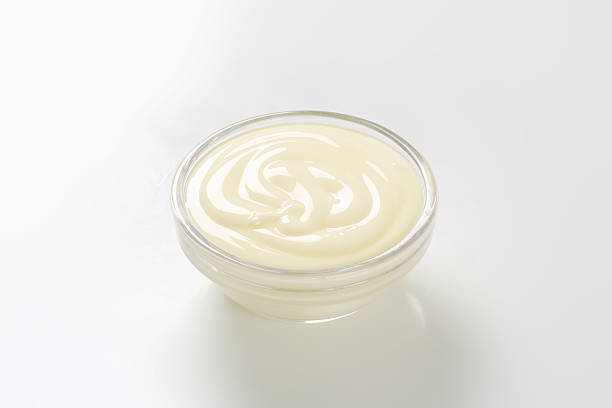 istock Close up of sour cream on white background 466120601