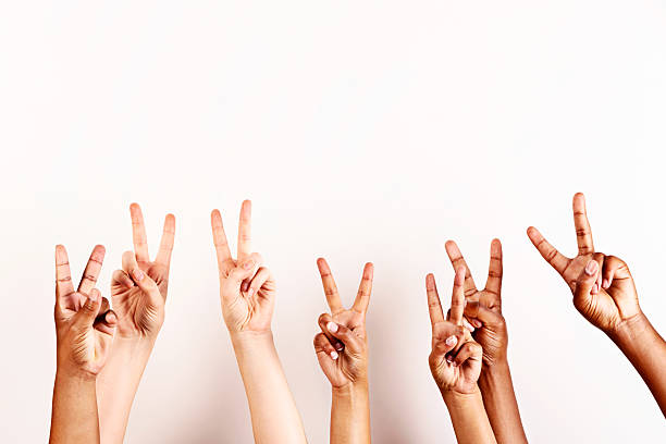 istock Peace to all! Seven hands giving V-sign 466124747