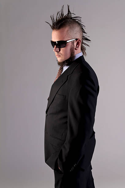 istock Male Model With Mohawk Dressed In a Business Suit 466124749