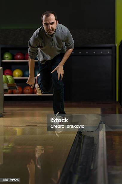 Bowler Attempts To Take Out Remaining Pins Stock Photo - Download Image Now - Active Lifestyle, Activity, Adult