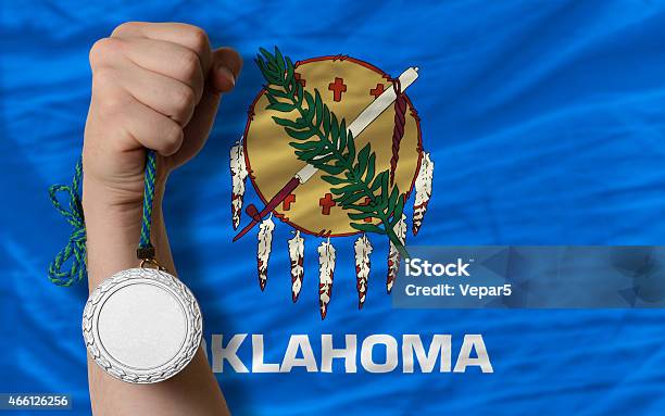 Silver Medal For Sport And Flag Of Oklahoma Stock Photo - Download Image Now - 2015, Achievement, Adult