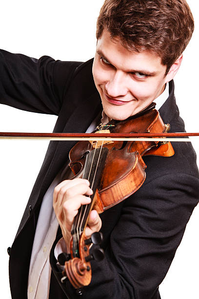 istock Man violinist playing violin. Classical music art 466128572