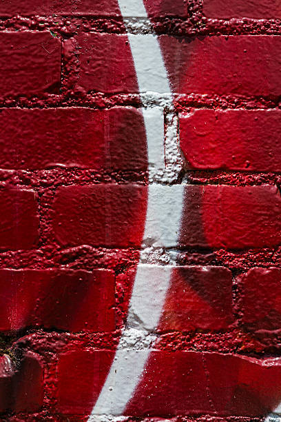 istock Background of red brick with curved white stripe. 466130096