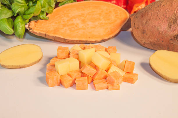 istock Sweet potato and potato dice 466130614