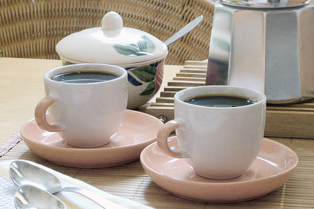 istock Two cups of coffee and a kettle 466130748