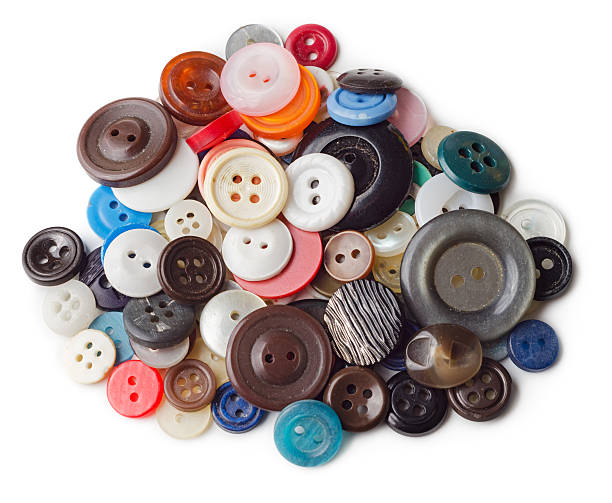 istock Pile of old and used clothes buttons 466130976