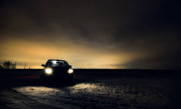 Car headlights turned in night field