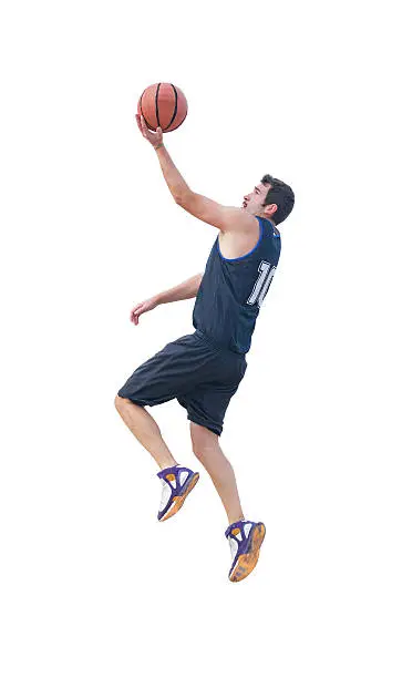 basketball player making a lay up on white background