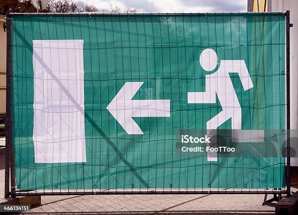 Emergency Exit Sign Stock Photo - Download Image Now - Arrow Symbol, Billboard, Emergency Exit