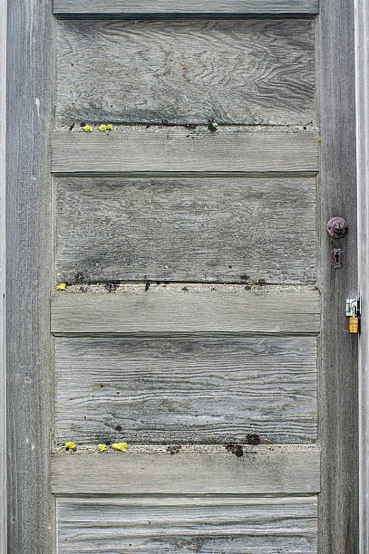 istock Vintage wooden door with worn finish 466138372