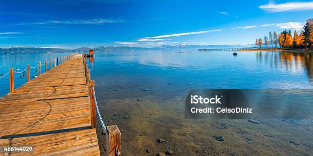 Pier In A Lake Stock Photo - Download Image Now - Autumn, Boardwalk, Color Image